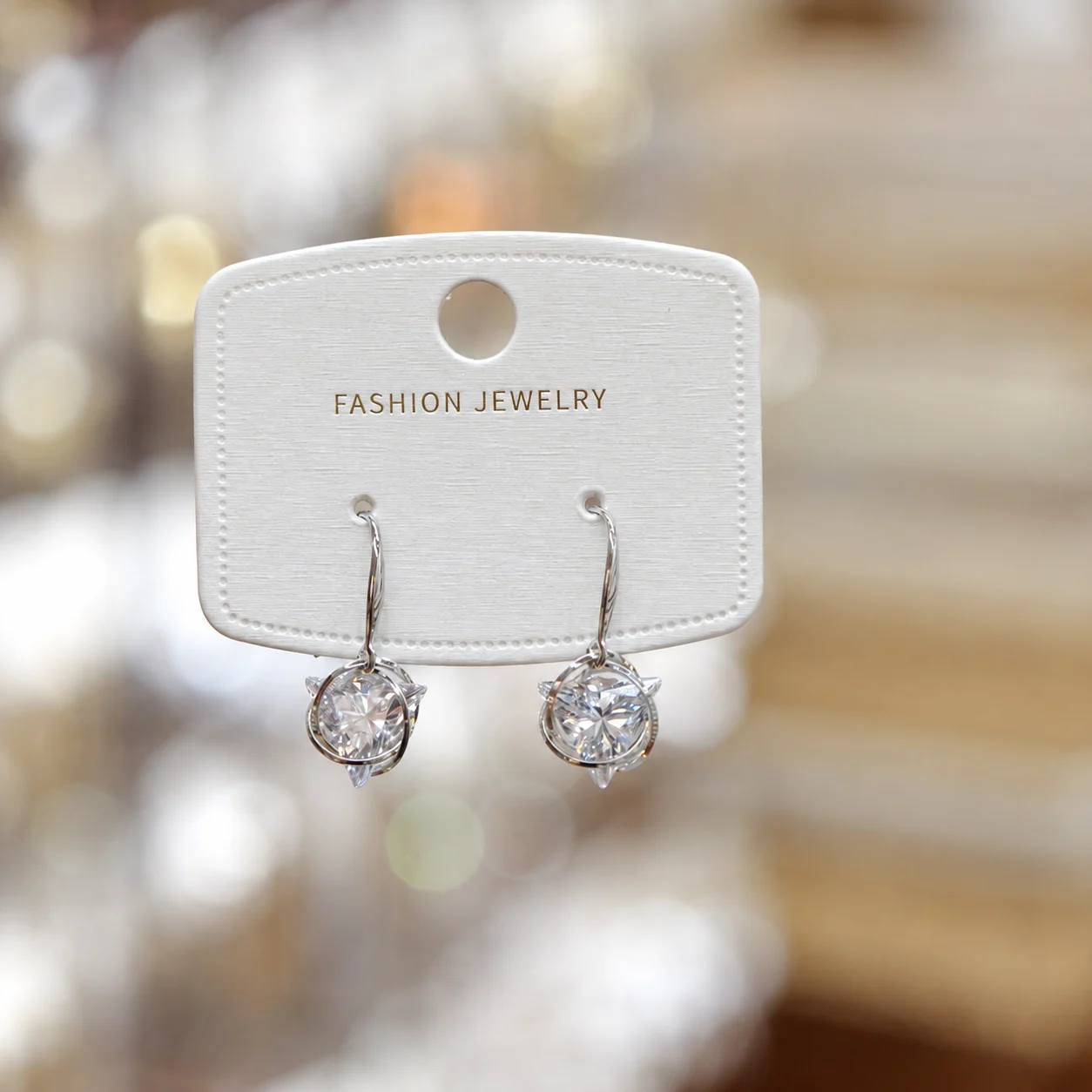 Silver-tone Drop Earrings with Round Clear Faceted Stones