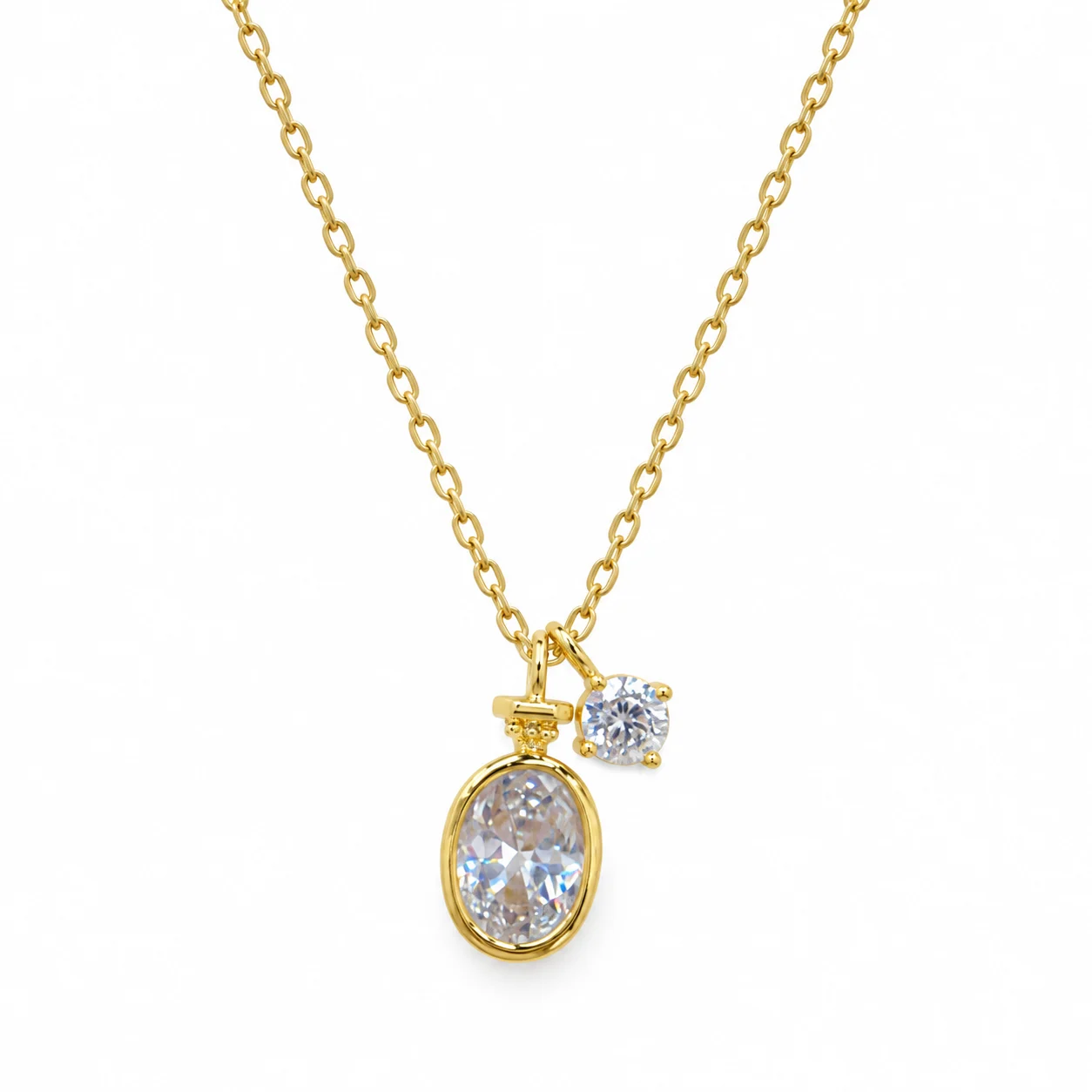 Gold-tone Necklace with Oval and Round Clear Stone Pendants