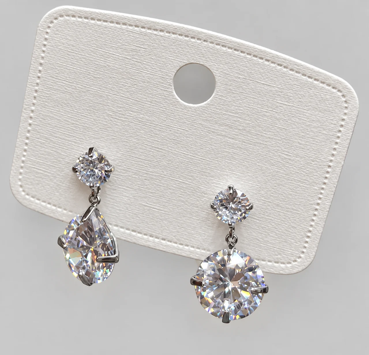 Silver-tone Drop Earrings with Round and Teardrop-shaped Clear Accents