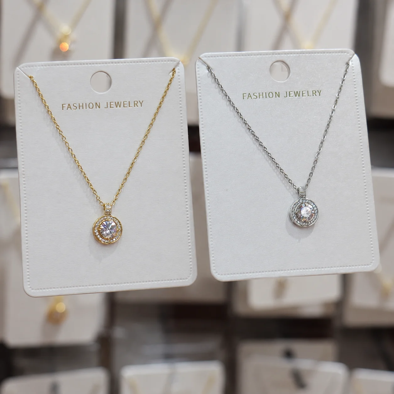 Round Halo Pendant Necklaces in Gold-tone and Silver-tone Versions