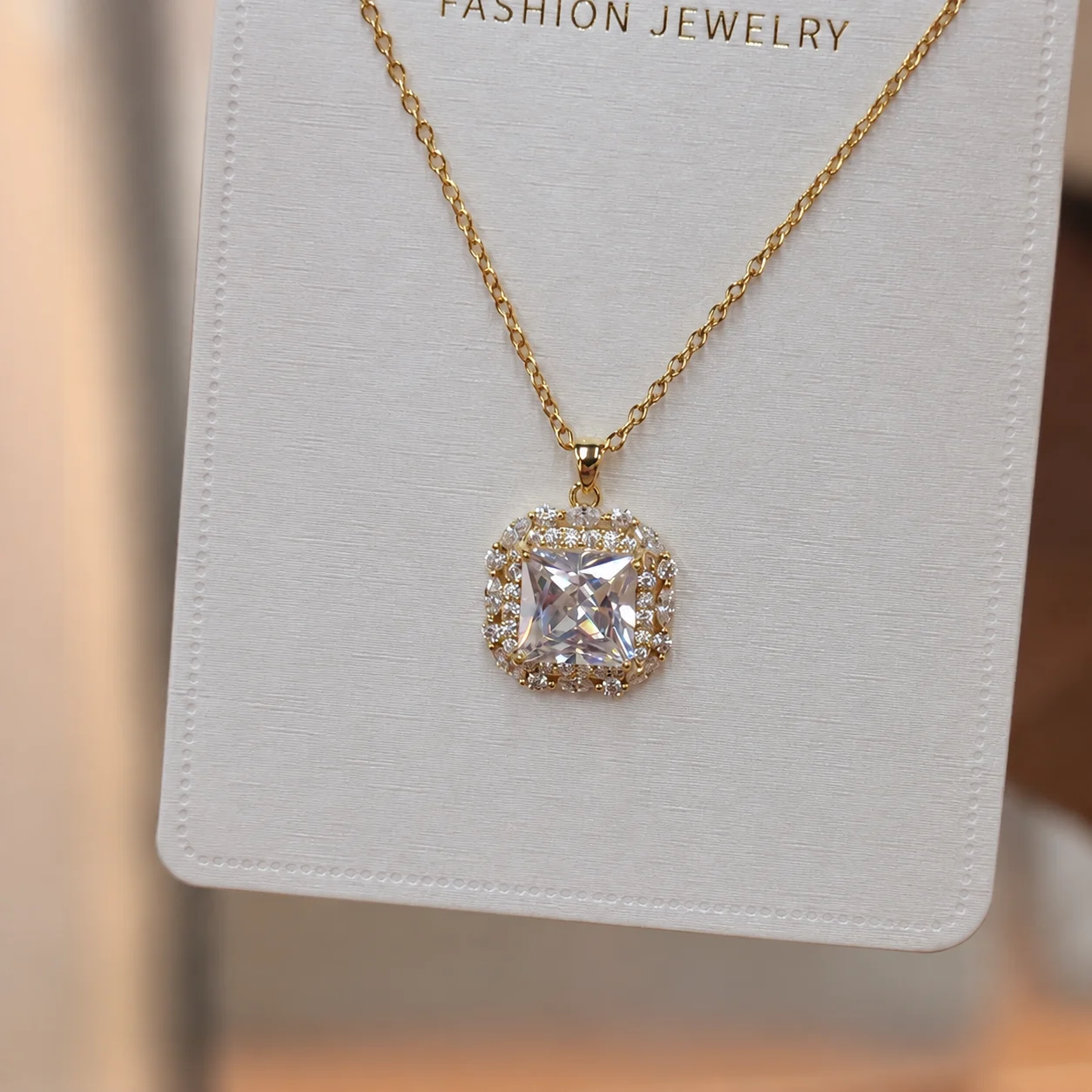 Gold-tone Necklace with Clear Square Halo Pendant