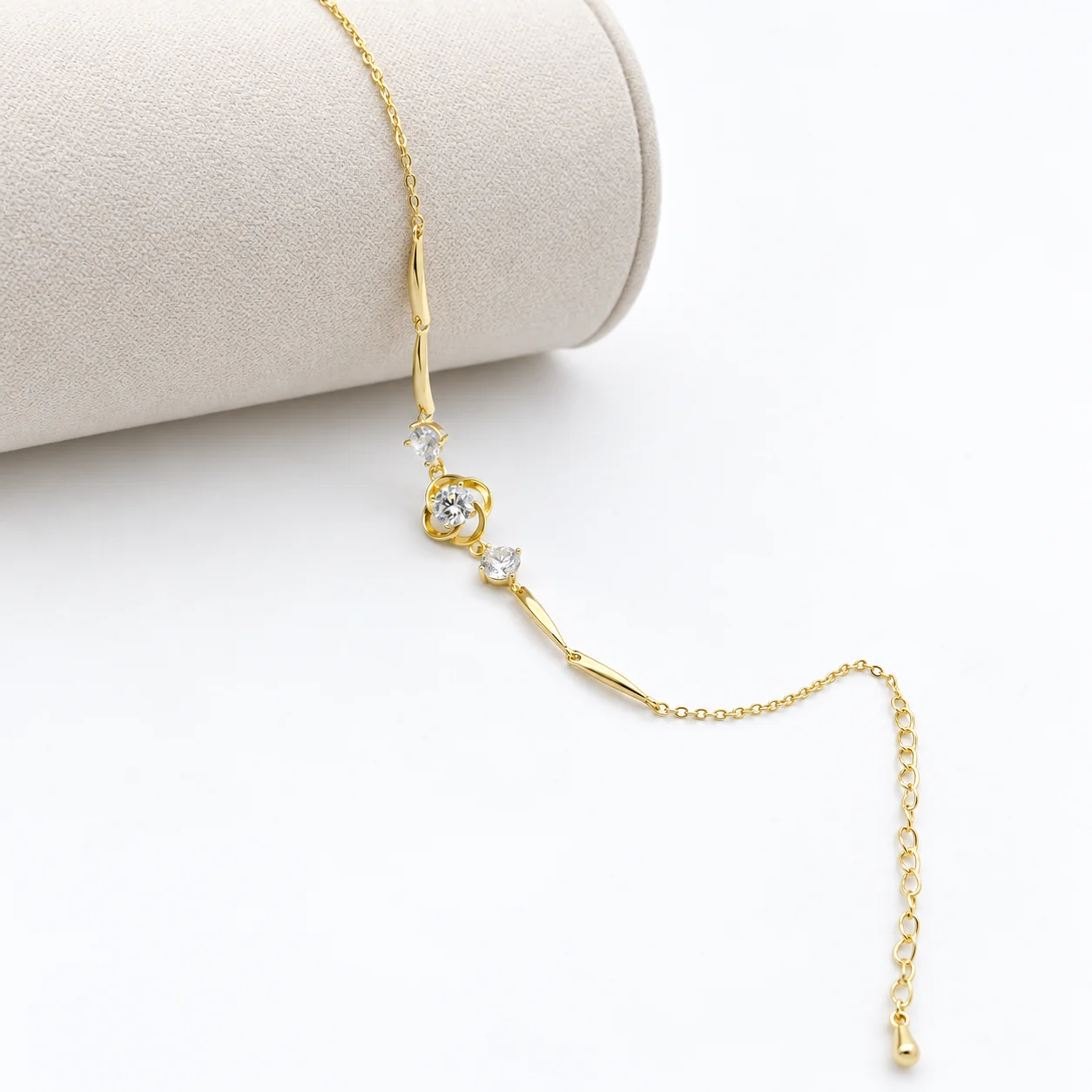 Gold-tone Chain Bracelet with Openwork Flower and Clear Stones